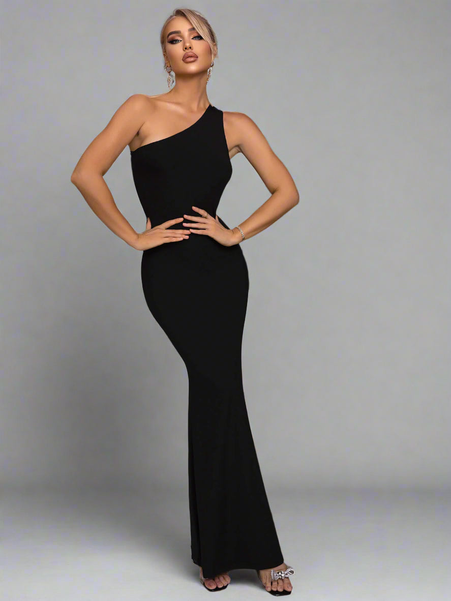 A woman wearing Cutout One-Shoulder Maxi Dress
