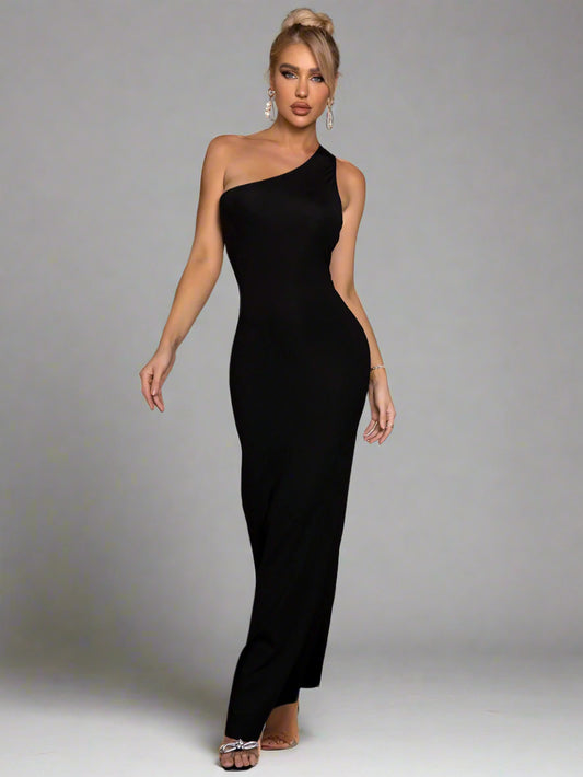 A woman wearing Cutout One-Shoulder Maxi Dress
