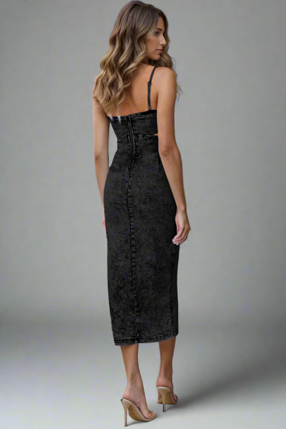 A woman is wearing Cutout Slit Spaghetti Strap Denim Dress

