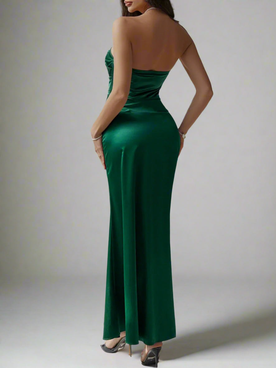 A woman is wearing Devine Ruched Tube Maxi Dress
