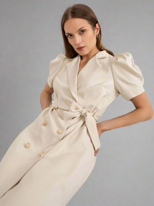 A woman is wearing Knot Your Average Blazer Dress
