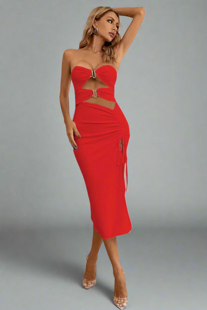 A woman is wearing The Bare Intentions Bandage Dress





