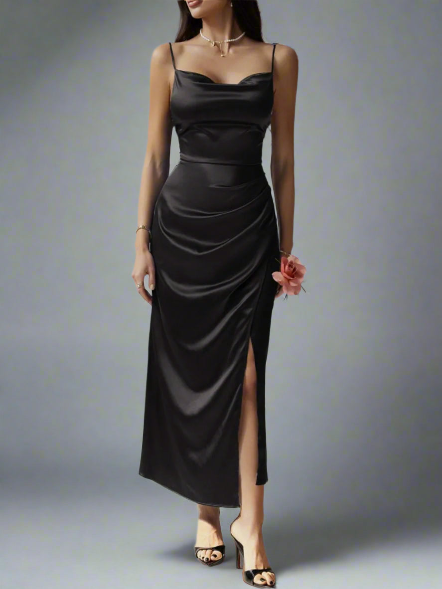 A woman is wearing The Goddess Motion Dress
