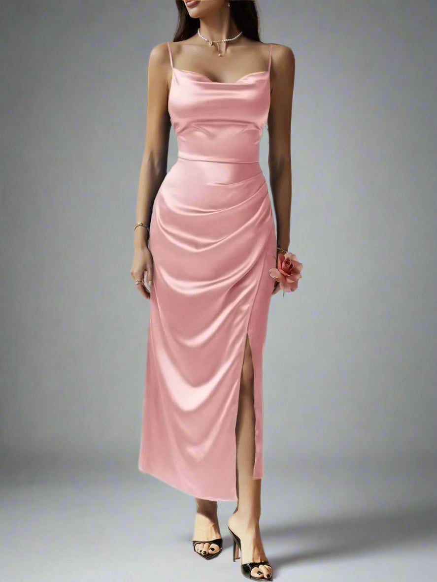 A woman is wearing The Goddess Motion Dress
