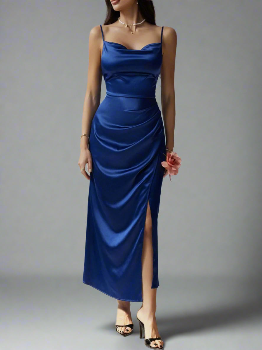 A woman is wearing The Goddess Motion Dress
