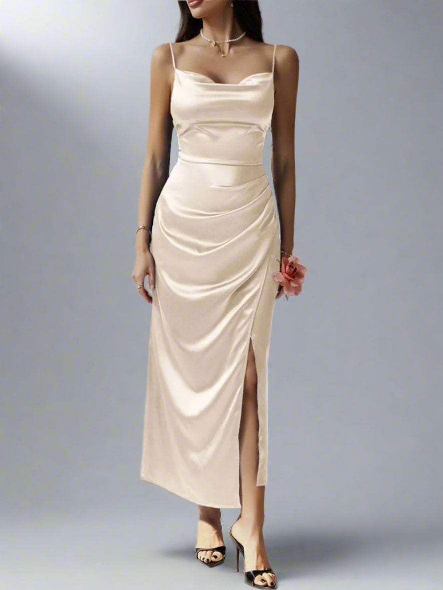 A woman is weearing The Goddess Motion Dress
