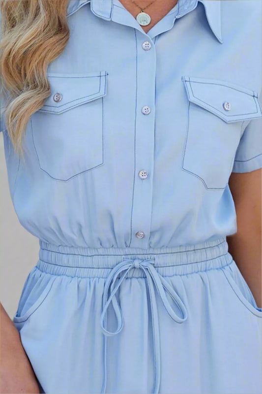 A woman is wearing The Midnight Wrangler Drawstring Denim Dress
