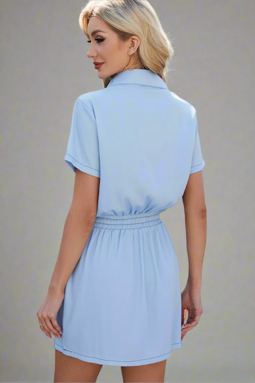 A woman is wearing The Midnight Wrangler Drawstring Denim Dress





