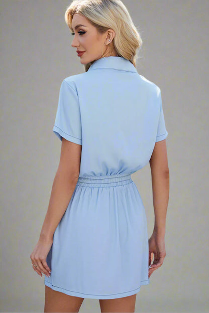 A woman is wearing The Midnight Wrangler Drawstring Denim Dress





