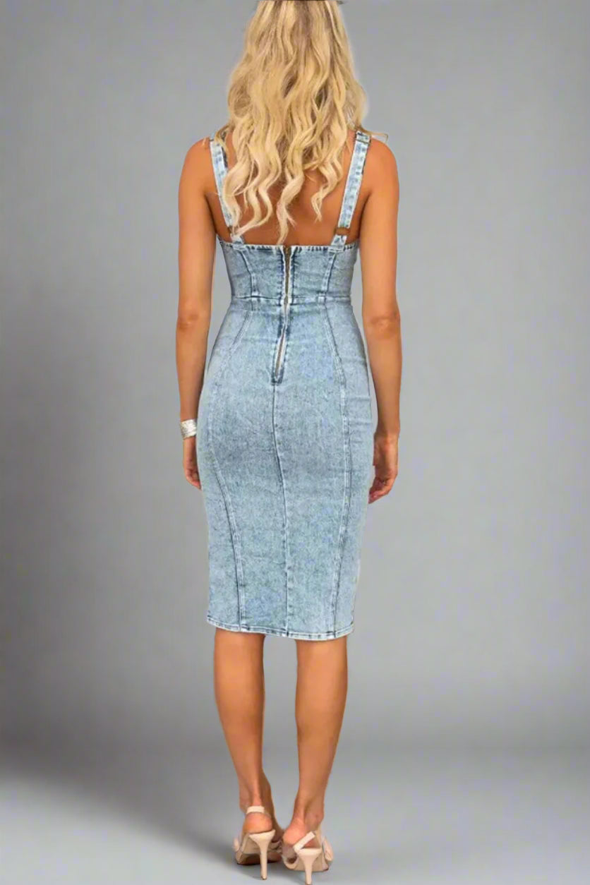 A woman is wearing The Pick Me Up At 7 Side Slit Washed Scoop Neck Denim Dress