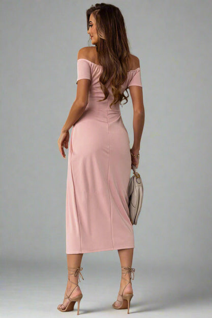 A woman is wearing a The Soft Serve Midi Off-Shoulder Split Dress
