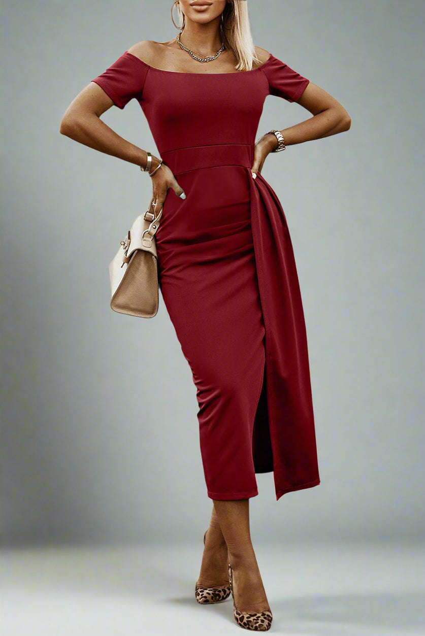 woman is wearing The Soft Serve Midi Off-Shoulder Split Dress
