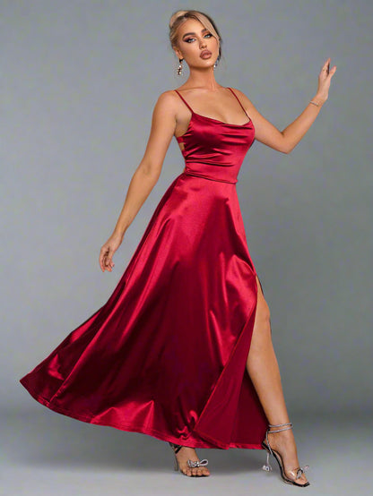 a woman is wearing a The Velvet Vow Dress in Merlot Satin
