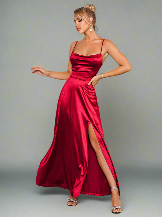 A women modelling a The Velvet Vow Dress in Merlot Satin