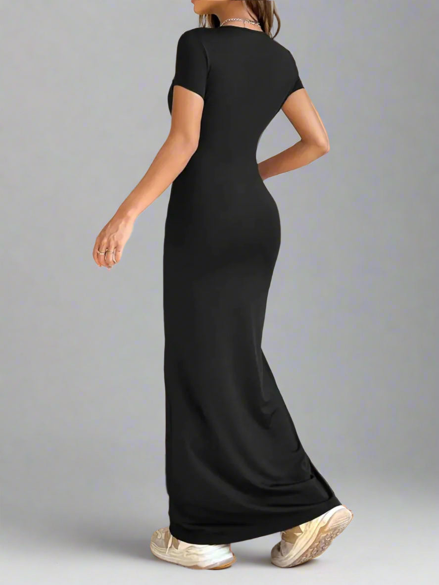 A woman is wearing Time For Spring Short Sleeve Maxi Tee Dress
