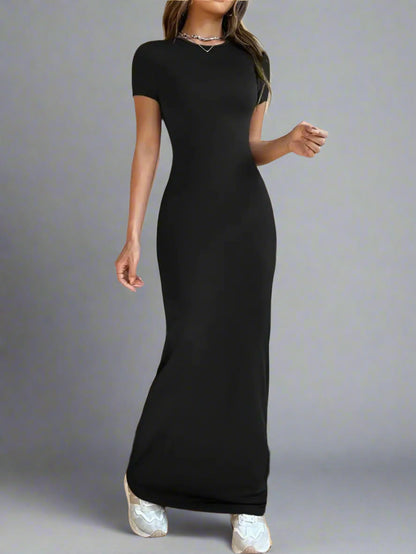 A woman is wearing Time For Spring Short Sleeve Maxi Tee Dress
