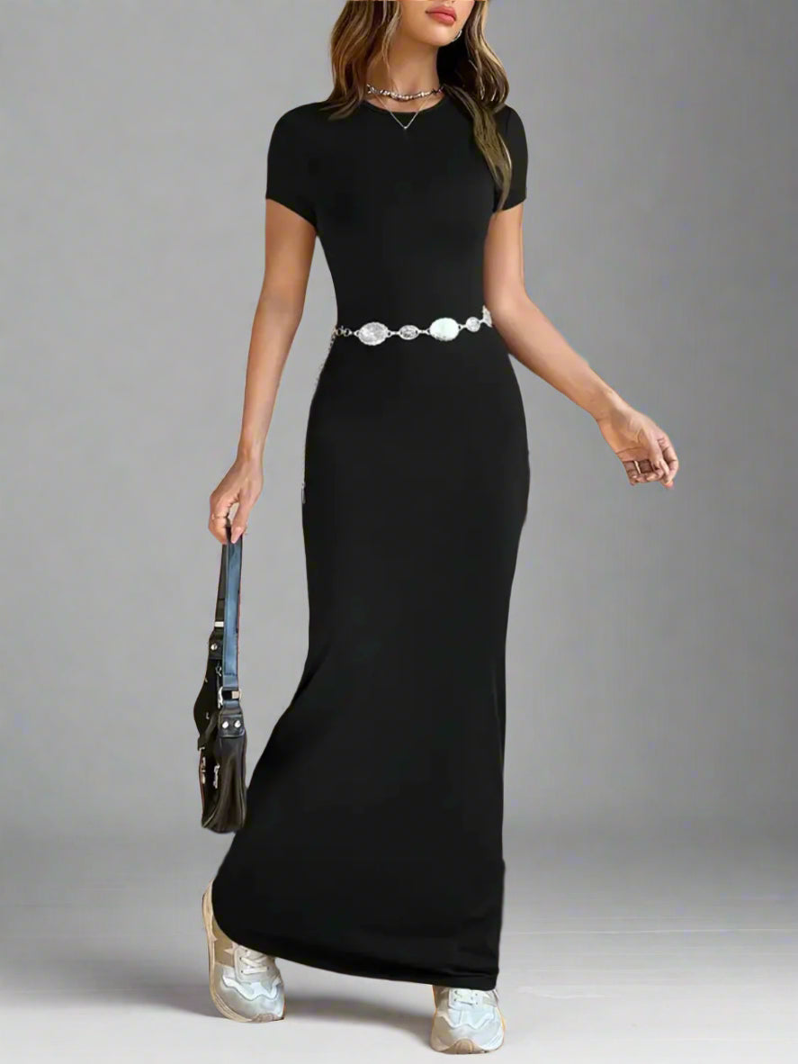 A woman is wearing Time For Spring Short Sleeve Maxi Tee Dress
