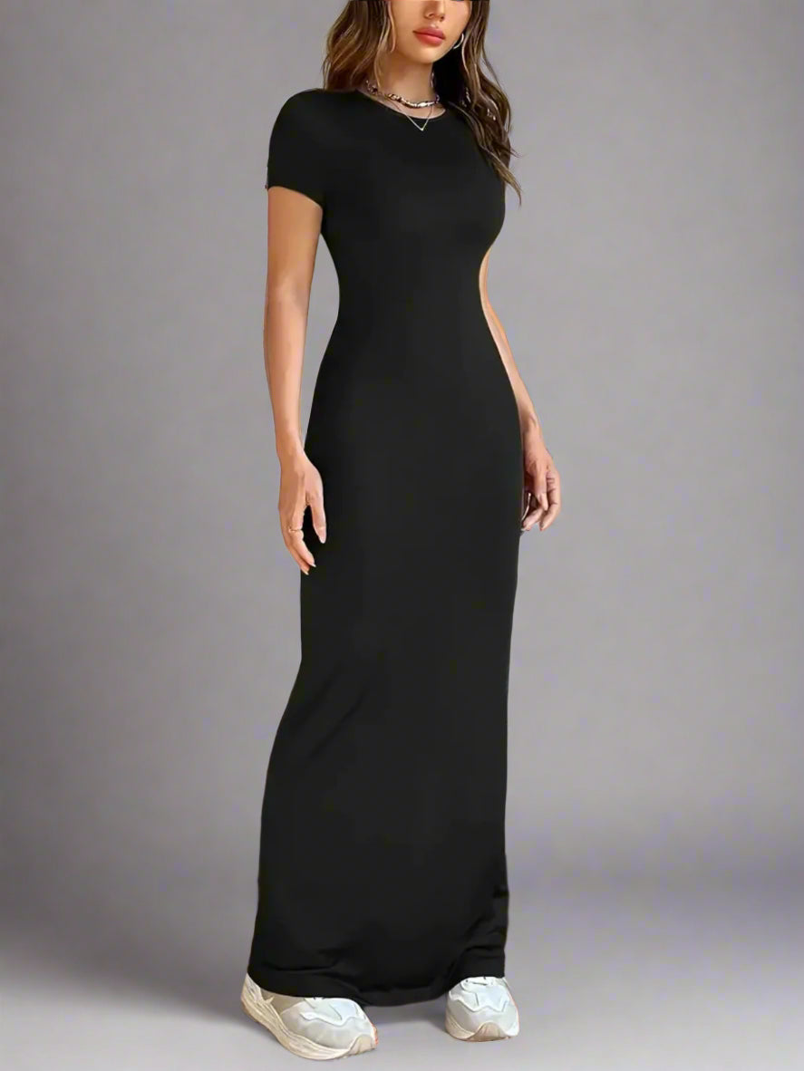 A woman is wearing Time For Spring Short Sleeve Maxi Tee Dress
