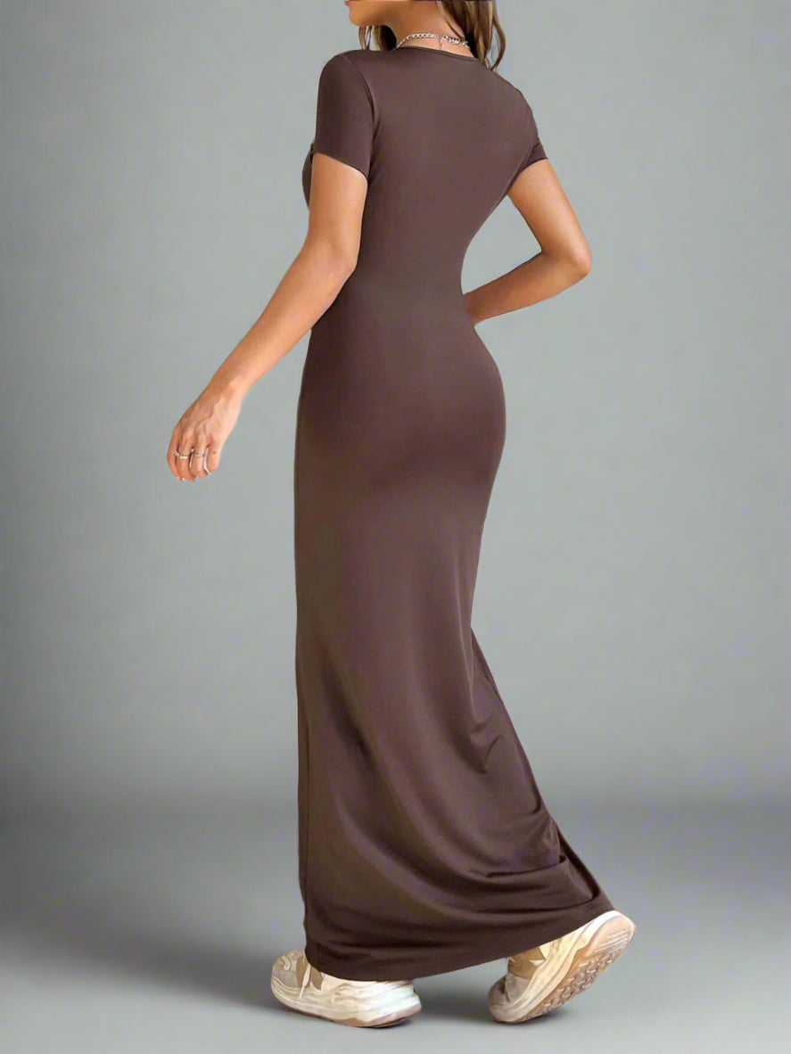 A woman is wearing Time For Spring Short Sleeve Maxi Tee Dress
