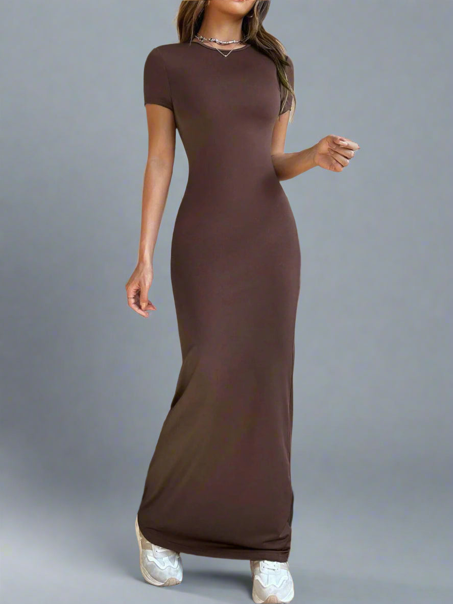 A woman is wearing Time For Spring Short Sleeve Maxi Tee Dress
