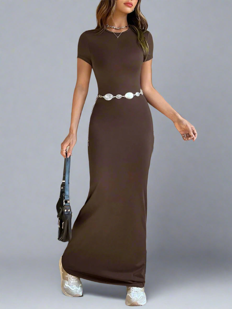 A woman is wearing Time For Spring Short Sleeve Maxi Tee Dress
