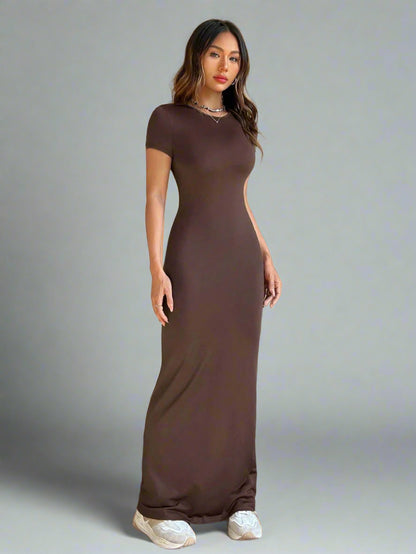 A woman is wearing Time For Spring Short Sleeve Maxi Tee Dress
