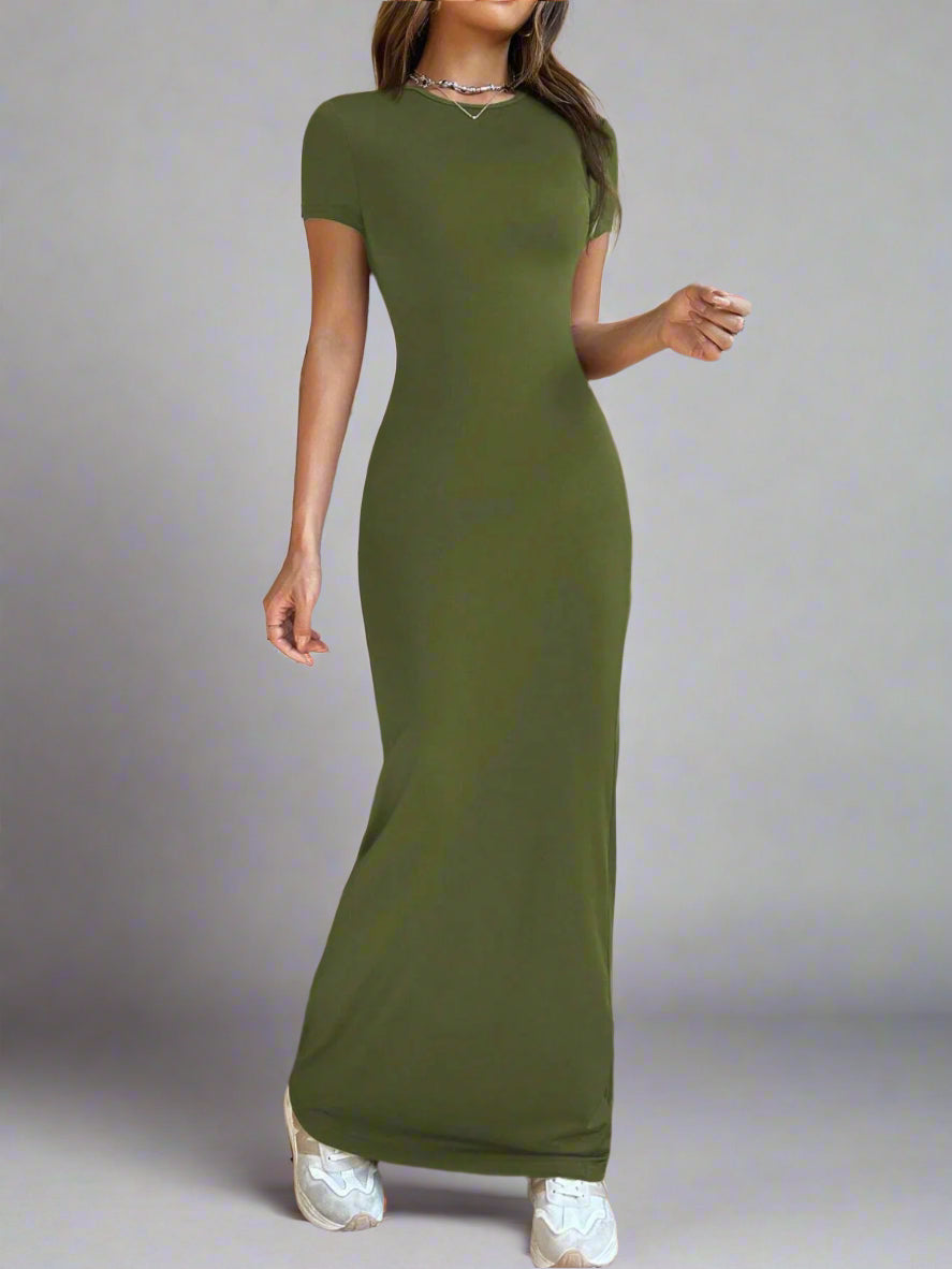 A woman is wearing Time For Spring Short Sleeve Maxi Tee Dress
