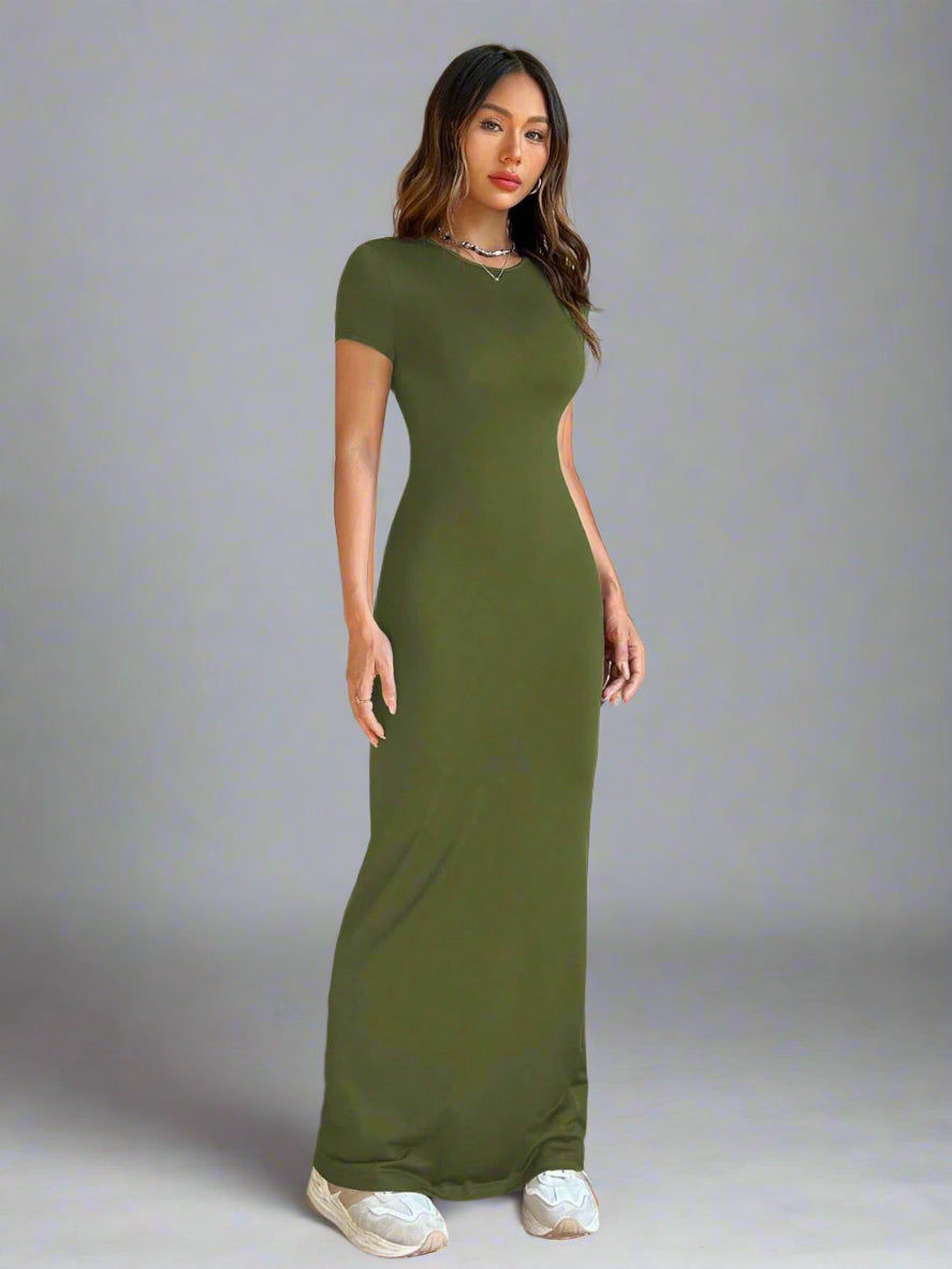 A woman is wearing Time For Spring Short Sleeve Maxi Tee Dress
