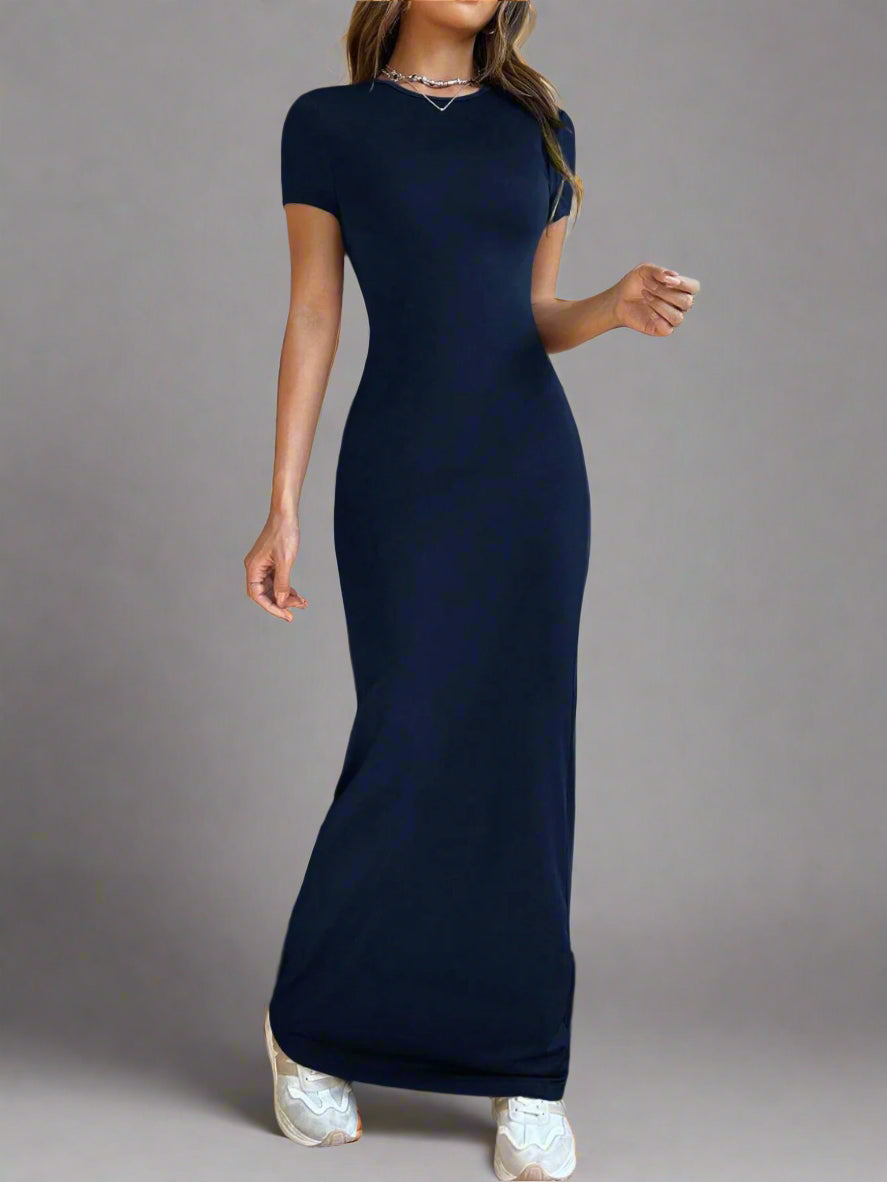 A woman is wearing Time For Spring Short Sleeve Maxi Tee Dress
