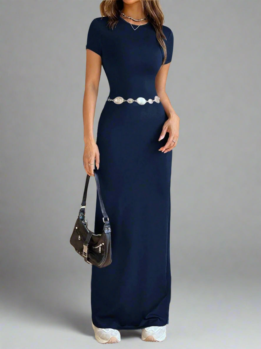 A woman is wearing Time For Spring Short Sleeve Maxi Tee Dress
