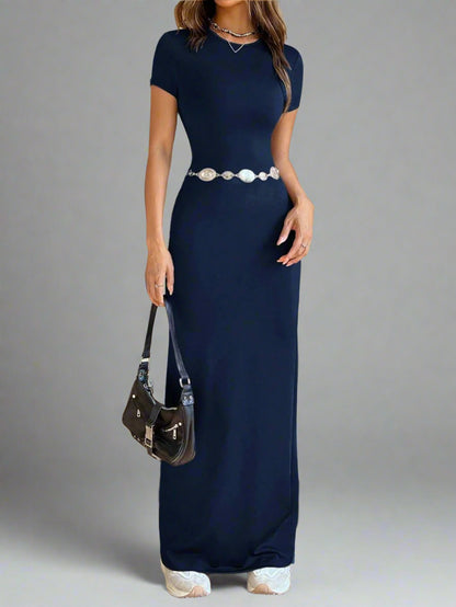 A woman is wearing Time For Spring Short Sleeve Maxi Tee Dress
